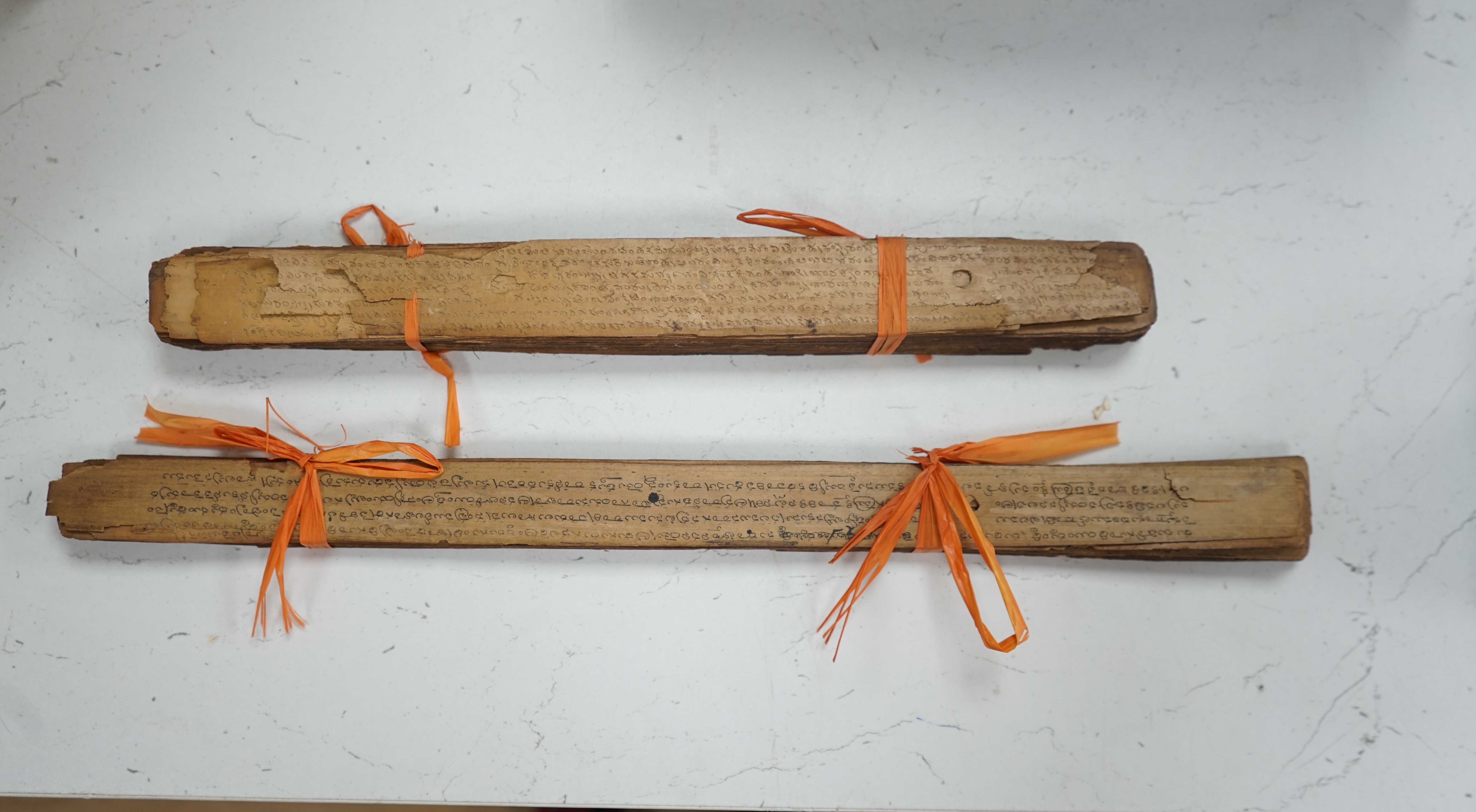 Two Thai or Burmese palm leaf prayer manuscripts. Condition - poor to fair